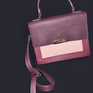 Nanette Lepore satchel bag in a multiple purple colors, faux leather. 